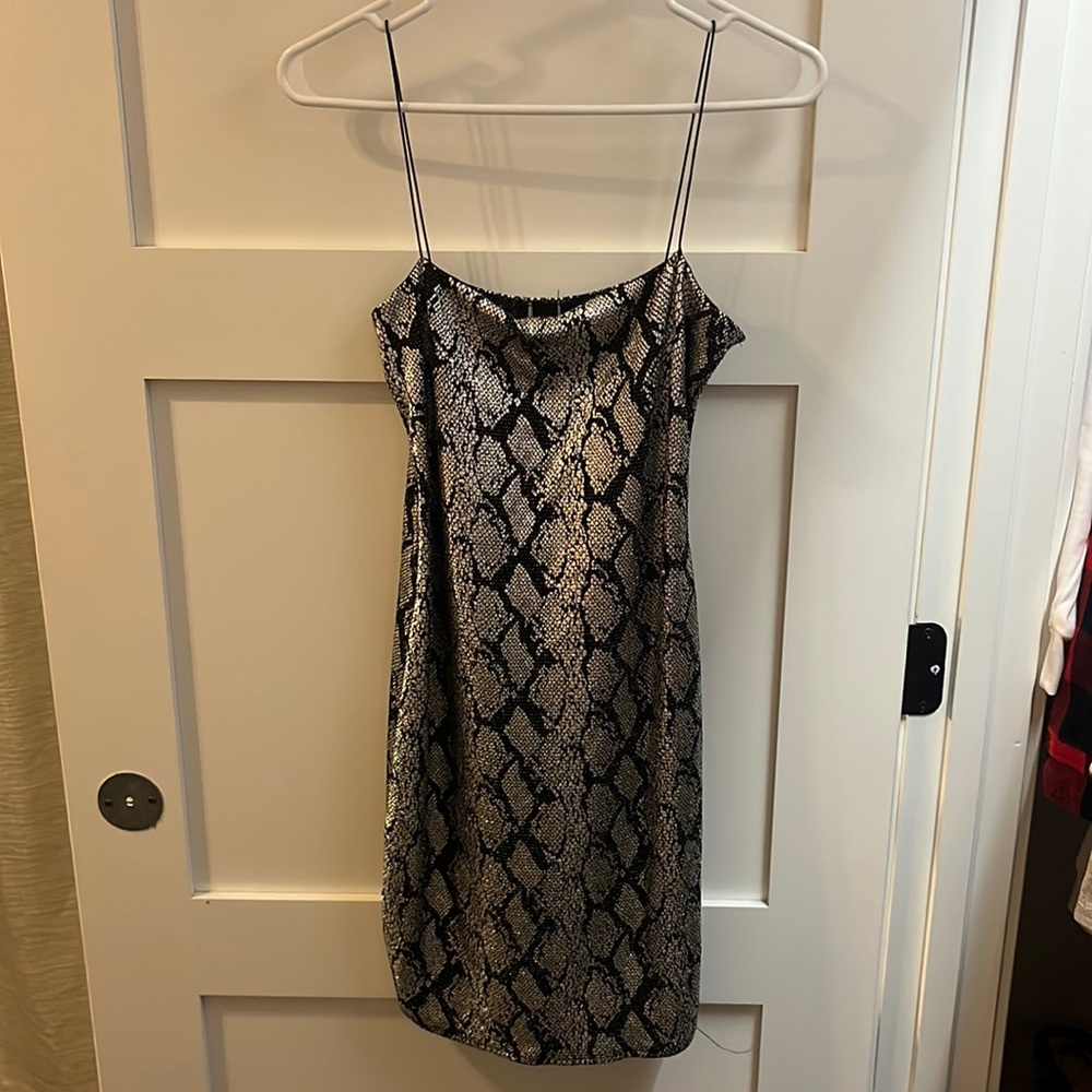 Medium sized tight Windsor snake skin dress